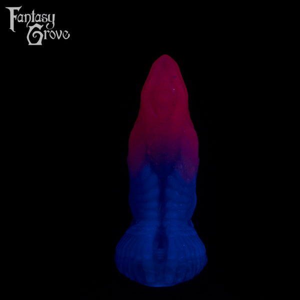 A fantasy sex toy on a black background with the Fantasy Grove logo in the upper left corner