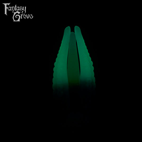 A fantasy sex toys on a black background with Fantasy Grove branding