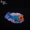 A fantasy sex toy on a black background with the Fantasy Grove logo in the upper left corner