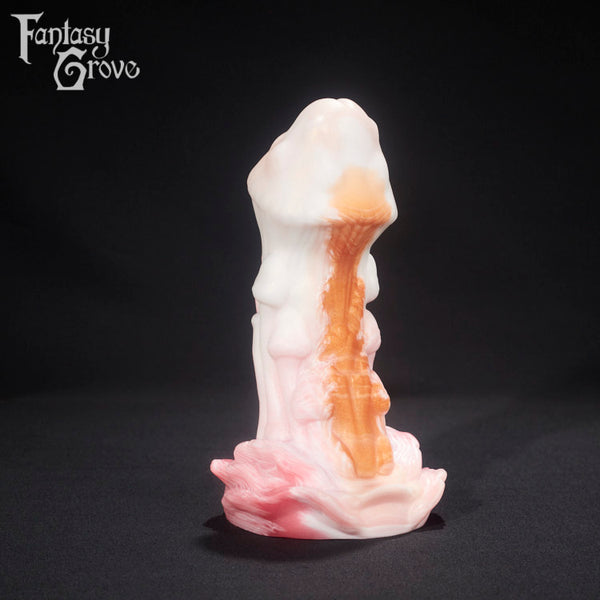 A fantasy sex toy on a black background with the Fantasy Grove logo in the upper left corner 