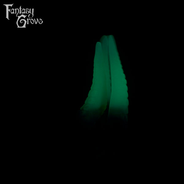 A fantasy sex toys on a black background with Fantasy Grove branding