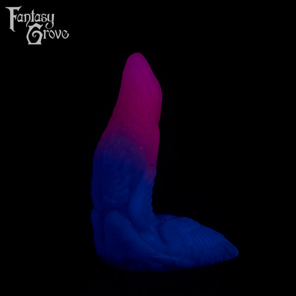 A fantasy sex toy on a black background with the Fantasy Grove logo in the upper left corner