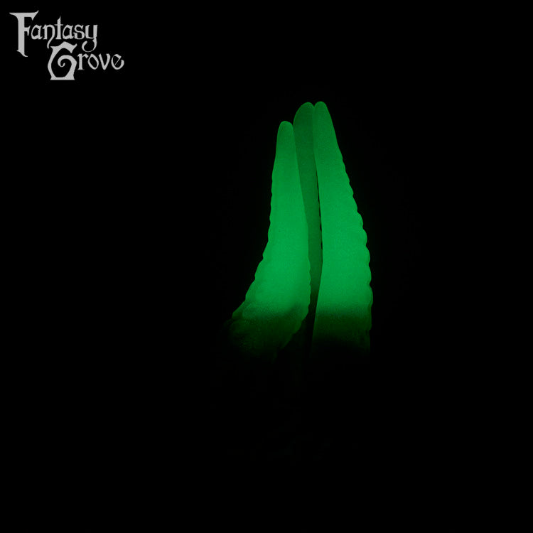 A fantasy sex toys on a black background with Fantasy Grove branding