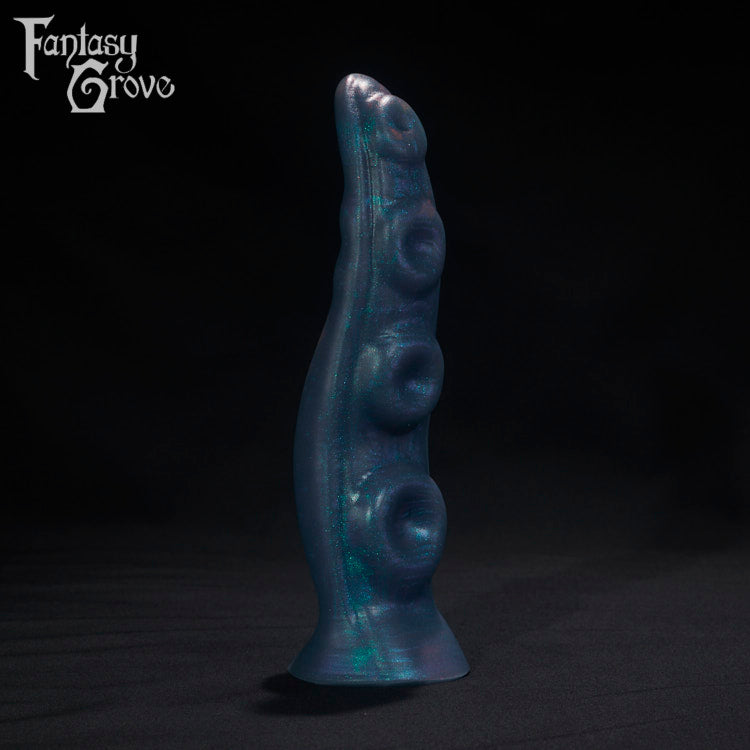 A Fantasy Grove sex toy on a black background with a logo in the upper left corner