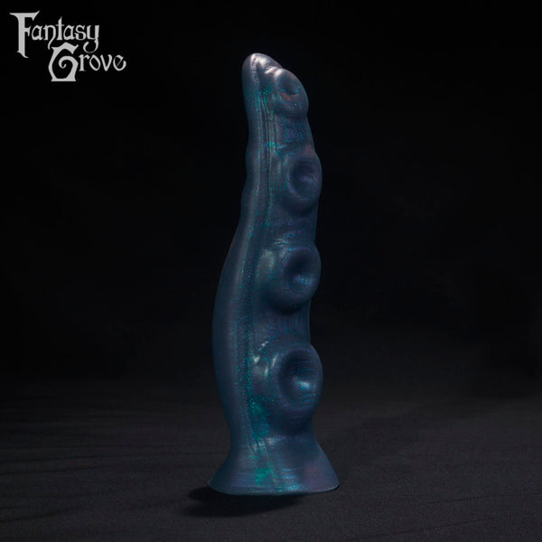 A Fantasy Grove sex toy on a black background with a logo in the upper left corner