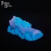 A fantasy sex toy on a black background with the Fantasy Grove logo in the upper left corner