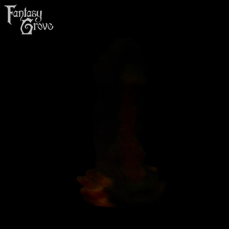 A fantasy sex toy on a black background with the Fantasy Grove logo in the upper left corner 