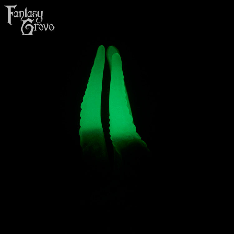 A fantasy sex toys on a black background with Fantasy Grove branding