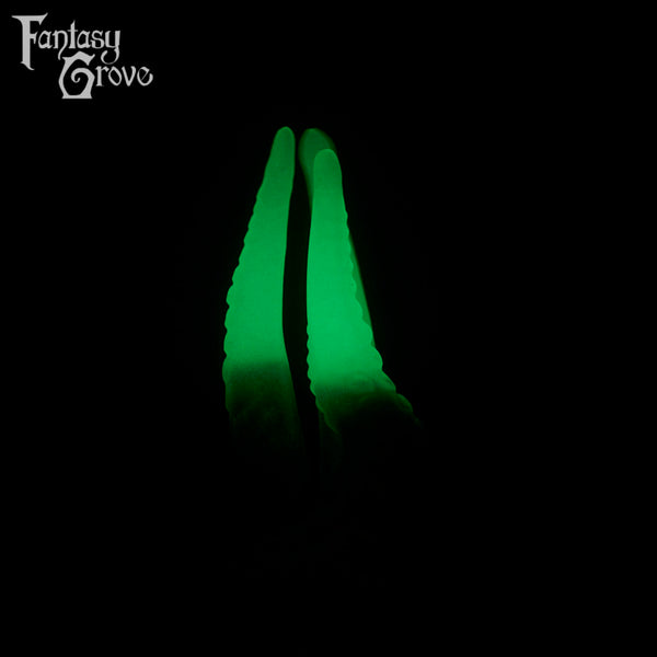 A fantasy sex toys on a black background with Fantasy Grove branding