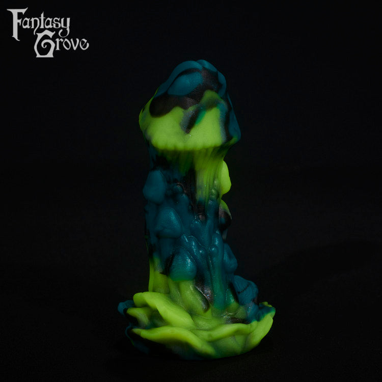 A fantasy sex toy on a black background with the Fantasy Grove logo in the upper left corner