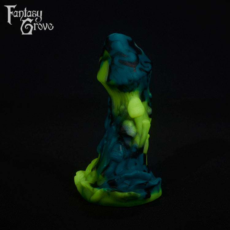 A fantasy sex toy on a black background with the Fantasy Grove logo in the upper left corner
