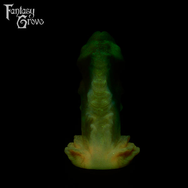 A fantasy sex toy on a black background with the Fantasy Grove logo in the upper left corner 