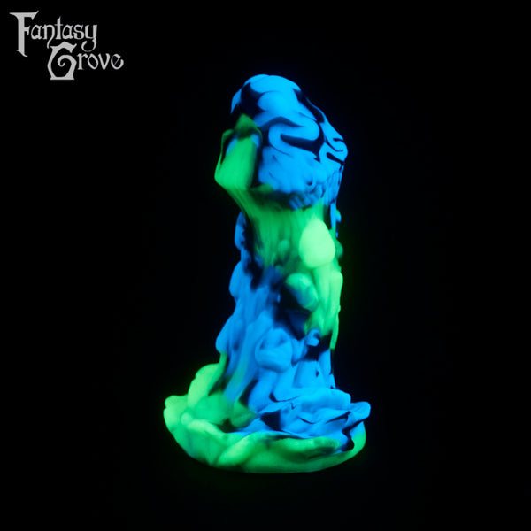 A fantasy sex toy on a black background with the Fantasy Grove logo in the upper left corner