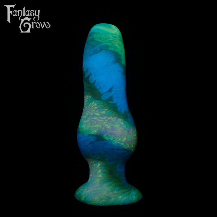 A fantasy sex toy on a black background with the Fantasy Grove logo in the upper left corner