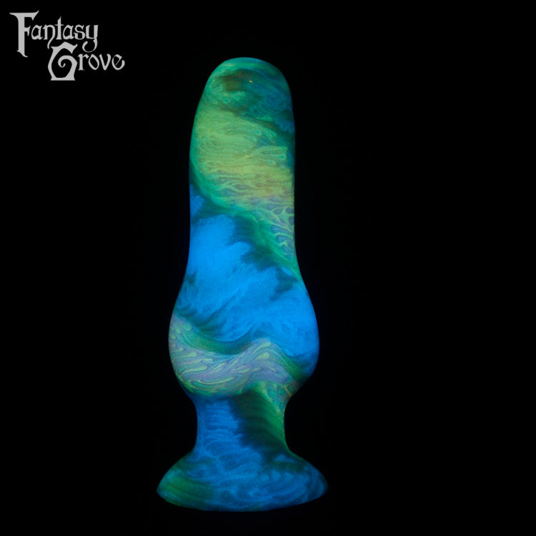 A fantasy sex toy on a black background with the Fantasy Grove logo in the upper left corner