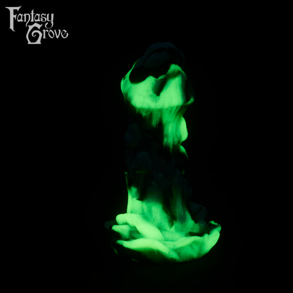 A fantasy sex toy on a black background with the Fantasy Grove logo in the upper left corner