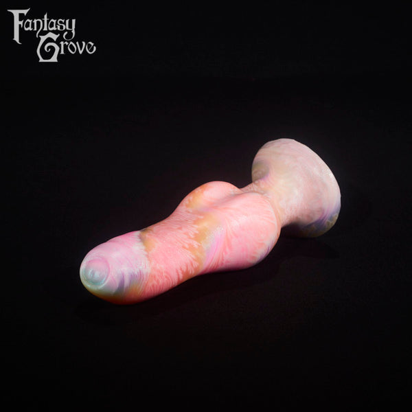 A fantasy sex toy on a black background with the Fantasy Grove logo in the upper left corner