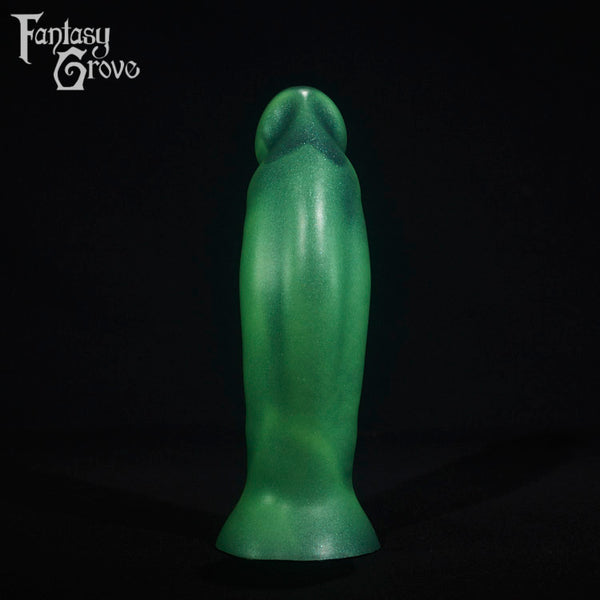 A fantasy sex toy on a black background with the Fantasy Grove logo in the upper left corner
