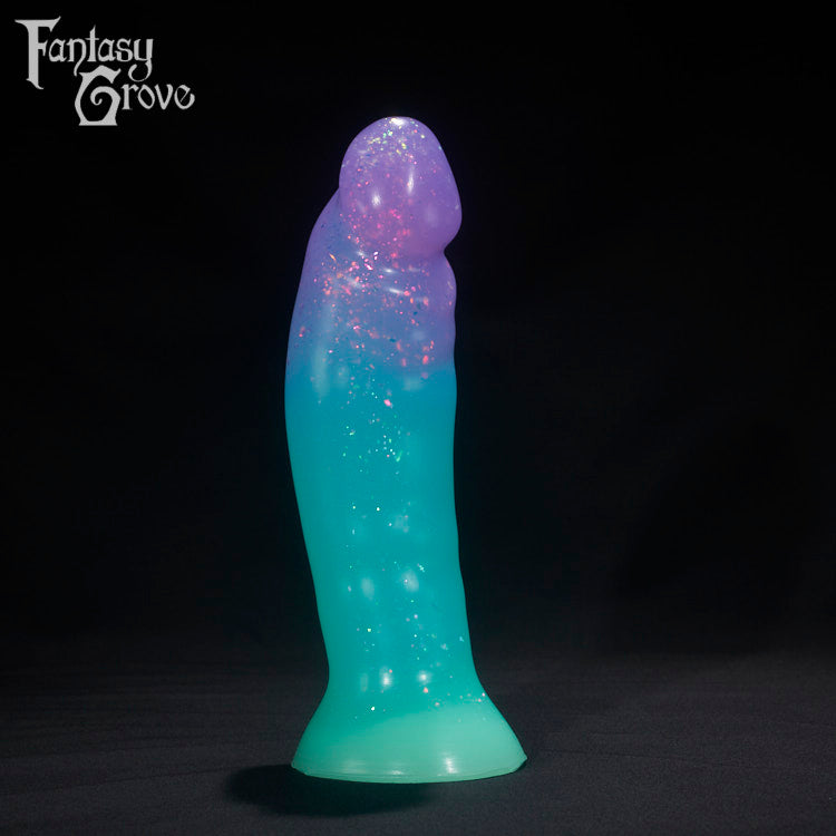 A Fantasy Grove sex toy on a black background with a logo in the upper left corner