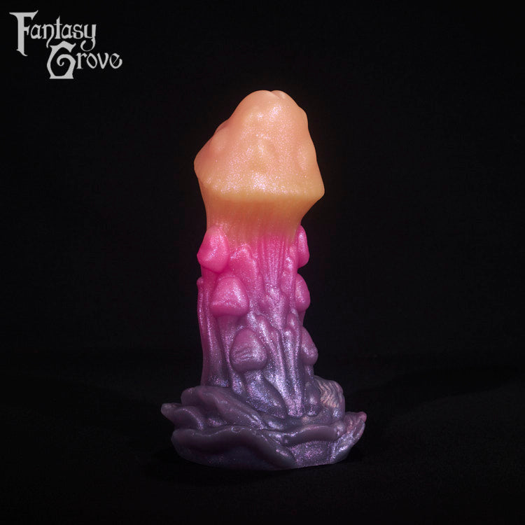 A fantasy sex toy on a black background with the Fantasy Grove logo in the upper left corner