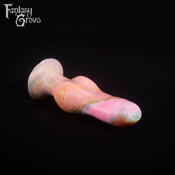 A fantasy sex toy on a black background with the Fantasy Grove logo in the upper left corner