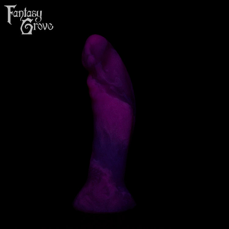 A fantasy sex toys on a black background with Fantasy Grove branding