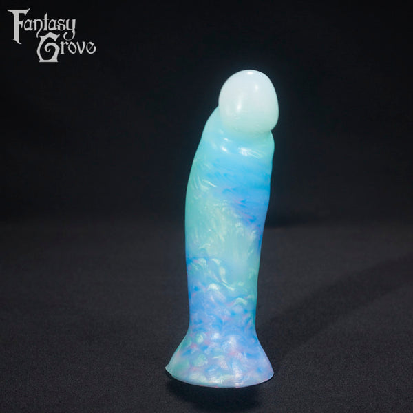 A fantasy sex toy on a black background with the Fantasy Grove logo in the upper left corner 