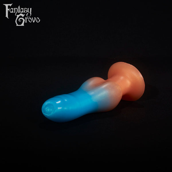 A fantasy sex toy on a black background with the Fantasy Grove logo in the upper left corner