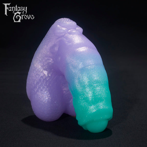 A Fantasy Grove sex toy on a black background with a logo in the upper left corner