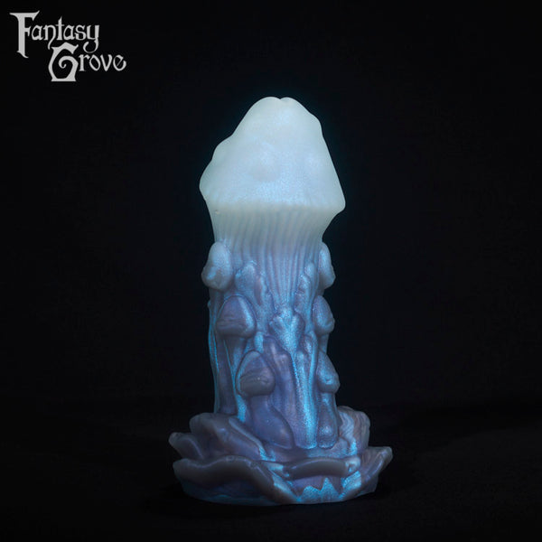 A fantasy sex toy on a black background with the Fantasy Grove logo in the upper left corner