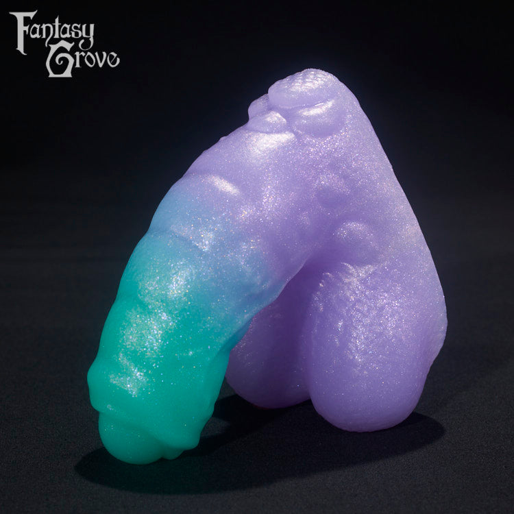 A Fantasy Grove sex toy on a black background with a logo in the upper left corner