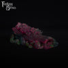 A fantasy sex toy on a black background with the Fantasy Grove logo in the upper left corner