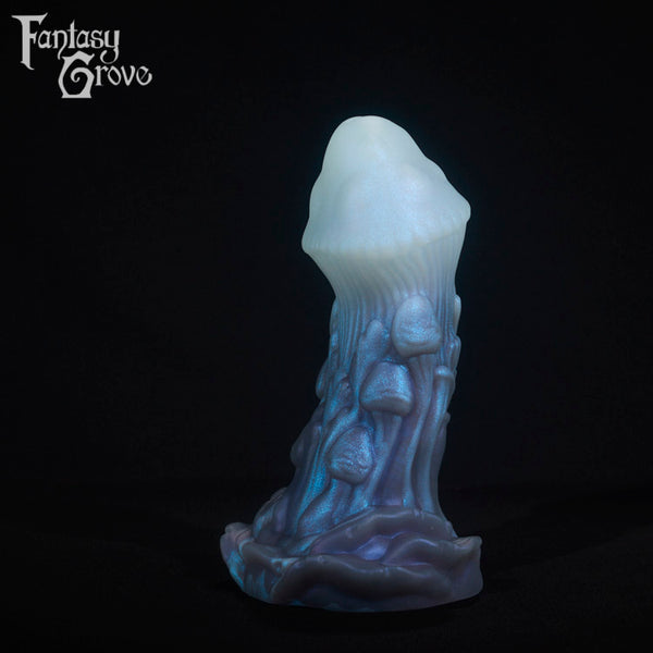 A fantasy sex toy on a black background with the Fantasy Grove logo in the upper left corner