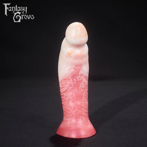A fantasy sex toy on a black background with the Fantasy Grove logo in the upper left corner 
