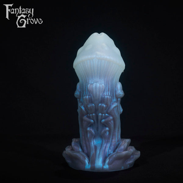 A fantasy sex toy on a black background with the Fantasy Grove logo in the upper left corner