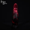 A fantasy sex toy on a black background with the Fantasy Grove logo in the upper left corner