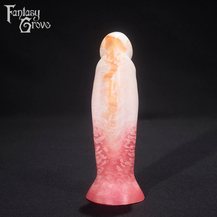 A fantasy sex toy on a black background with the Fantasy Grove logo in the upper left corner 
