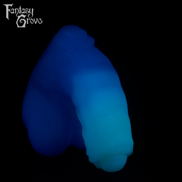 A Fantasy Grove sex toy on a black background with a logo in the upper left corner