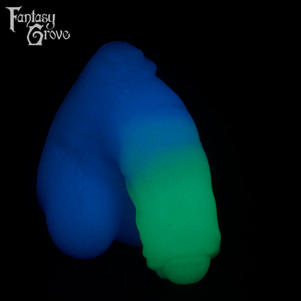 A Fantasy Grove sex toy on a black background with a logo in the upper left corner