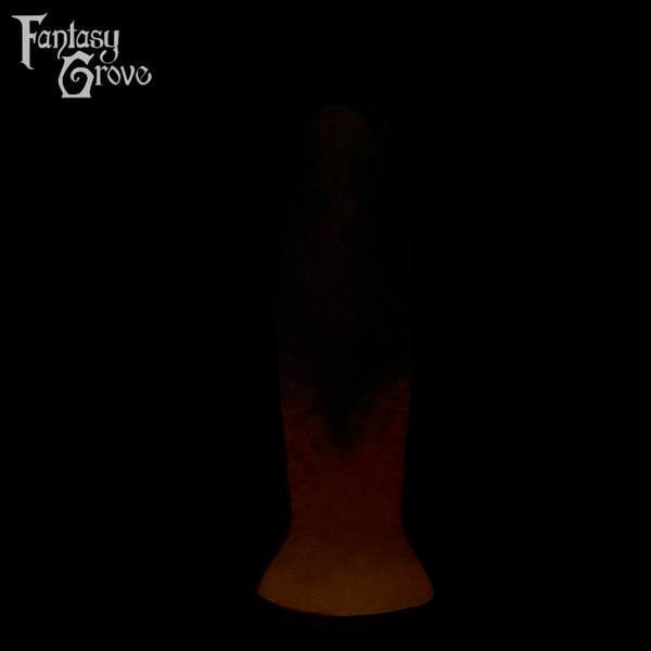 A fantasy sex toy on a black background with the Fantasy Grove logo in the upper left corner 