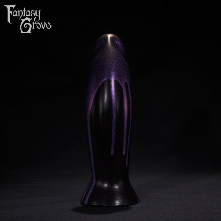 A Fantasy Grove sex toy on a black background with a logo in the upper left corner