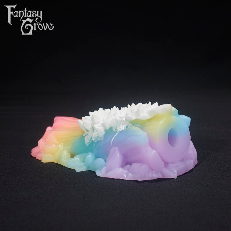A Fantasy Grove sex toy on a black background with a logo in the upper left corner