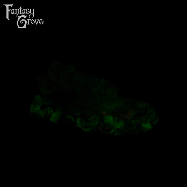 A fantasy sex toy on a black background with the Fantasy Grove logo in the upper left corner