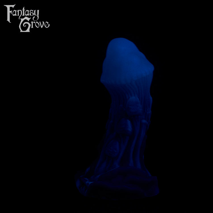 A fantasy sex toy on a black background with the Fantasy Grove logo in the upper left corner