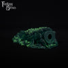 A fantasy sex toy on a black background with the Fantasy Grove logo in the upper left corner