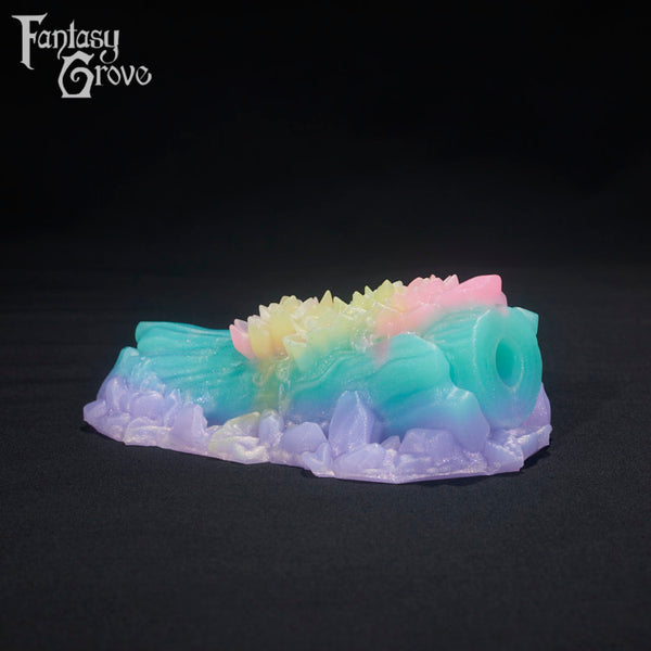 A fantasy sex toys on a black background with Fantasy Grove branding