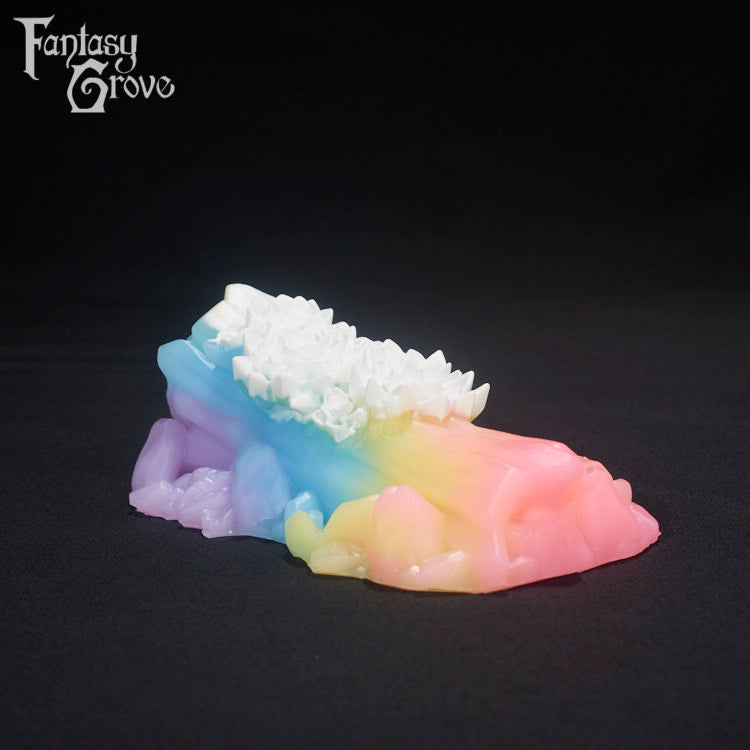 A Fantasy Grove sex toy on a black background with a logo in the upper left corner