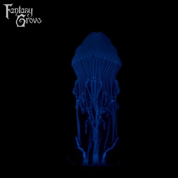A fantasy sex toy on a black background with the Fantasy Grove logo in the upper left corner