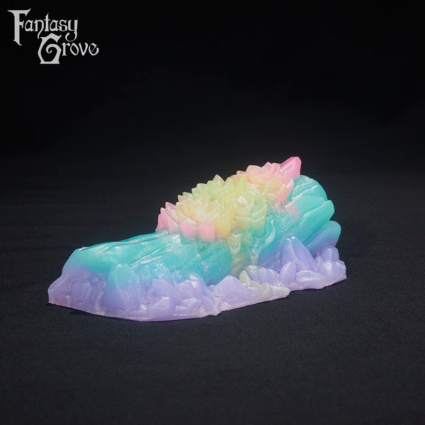 A fantasy sex toys on a black background with Fantasy Grove branding