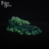 A fantasy sex toy on a black background with the Fantasy Grove logo in the upper left corner